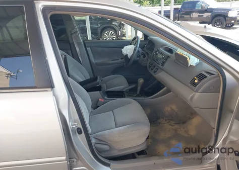 2003 Toyota Camry Le from USA, damaged, VIN 4T1BE32K23U134687